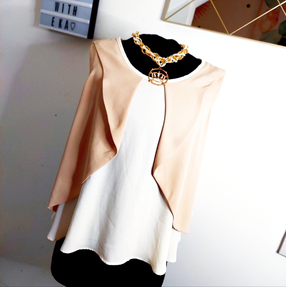 White / cream sleeveless top